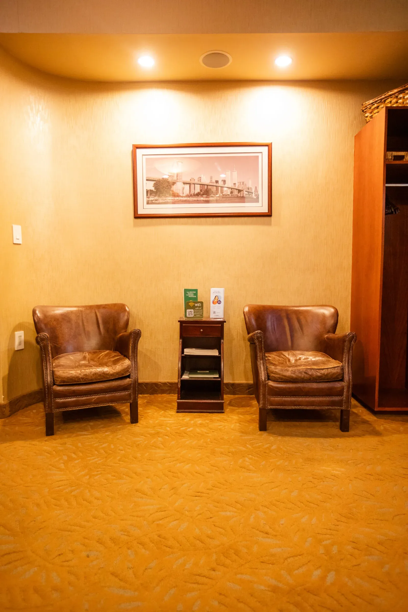 Leather armchairs in the waiting area at Creative Dentistry of Brooklyn Heights
