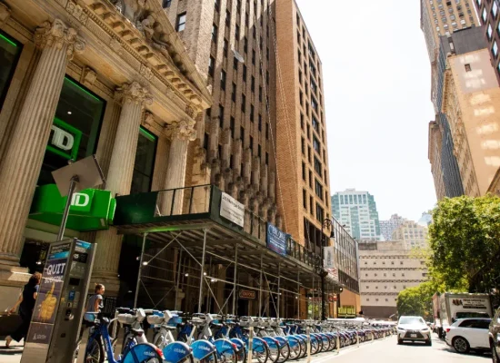 Street view of Montague Street in Brooklyn Heights near Creative Dentistry, with Citi Bike station and surrounding buildings